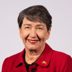 Portrait photo of Minister Michaela Settle.
