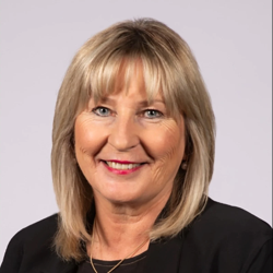 Portrait photo of Minister Gayle Tierney.